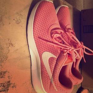 Light pink Nike Rosh shoes